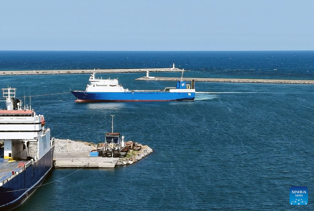 A drone photo taken on Aug. 23, 2026 shows the ship, named Ural and owned by Kalyoncu Denizcilik, at the port of Samsun, Türkiye. The ship, which was attacked around midnight off Russia's Black Sea port of Novorossiysk, has arrived at the Port of Samsun on Saturday. One sailor was killed and eight others were injured after it came under attack. (Mustafa Kaya/Handout via Xinhua)