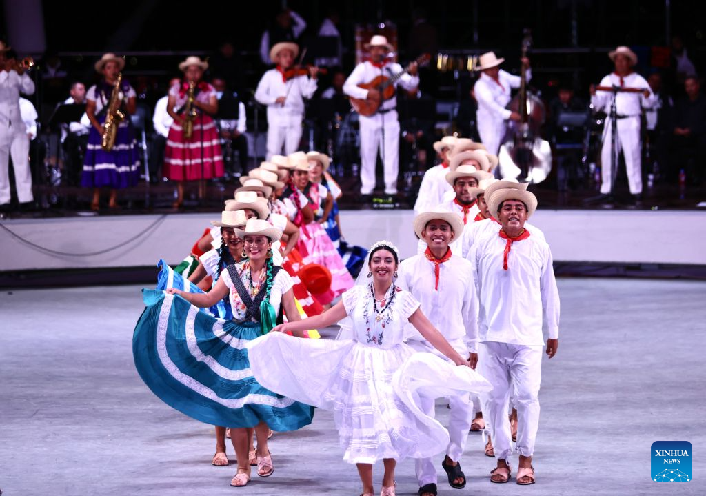 Performers dance at the Guelaguetza Auditorium in Oaxaca City, Mexico, July 27, 2026. Guelaguetza is an annual showcase of the indigenous cultures of Mexico, featured by traditional music, dance, and food.

The most important celebration of Guelaguetza happens on the last two Mondays of July every year at the Guelaguetza Auditorium on Fortin Hill, thus it's also called Mondays on the Hill. (Xinhua/Liu Wenhui)