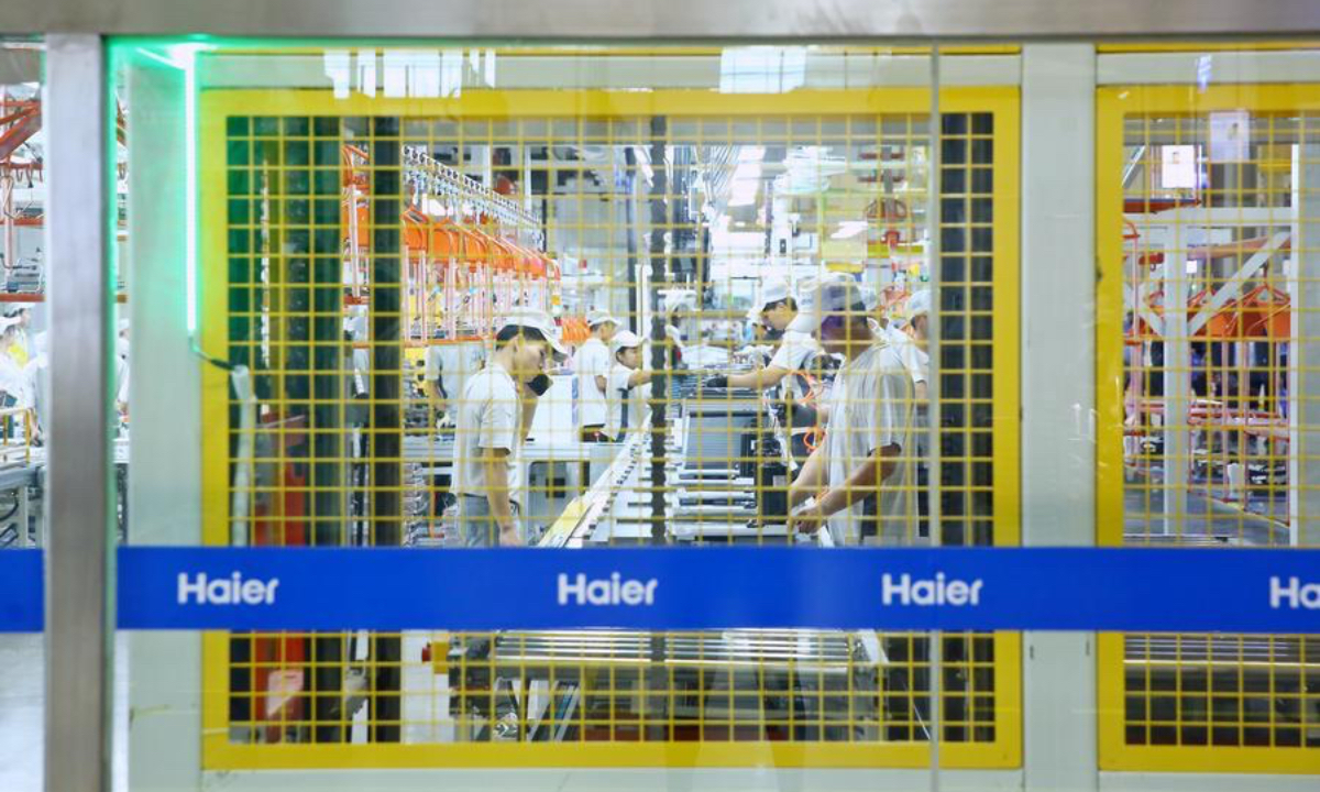 Staff work at a new air conditioner manufacturing plant of China's Haier in Chonburi, Thailand, Sept. 23, 2025. (Xinhua/Sun Weitong)