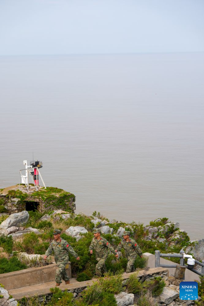 Militia members are pictured during a patrol on Kaishan Island in east China's Jiangsu Province, Sept. 13, 2026. (Xinhua/Li Bo)