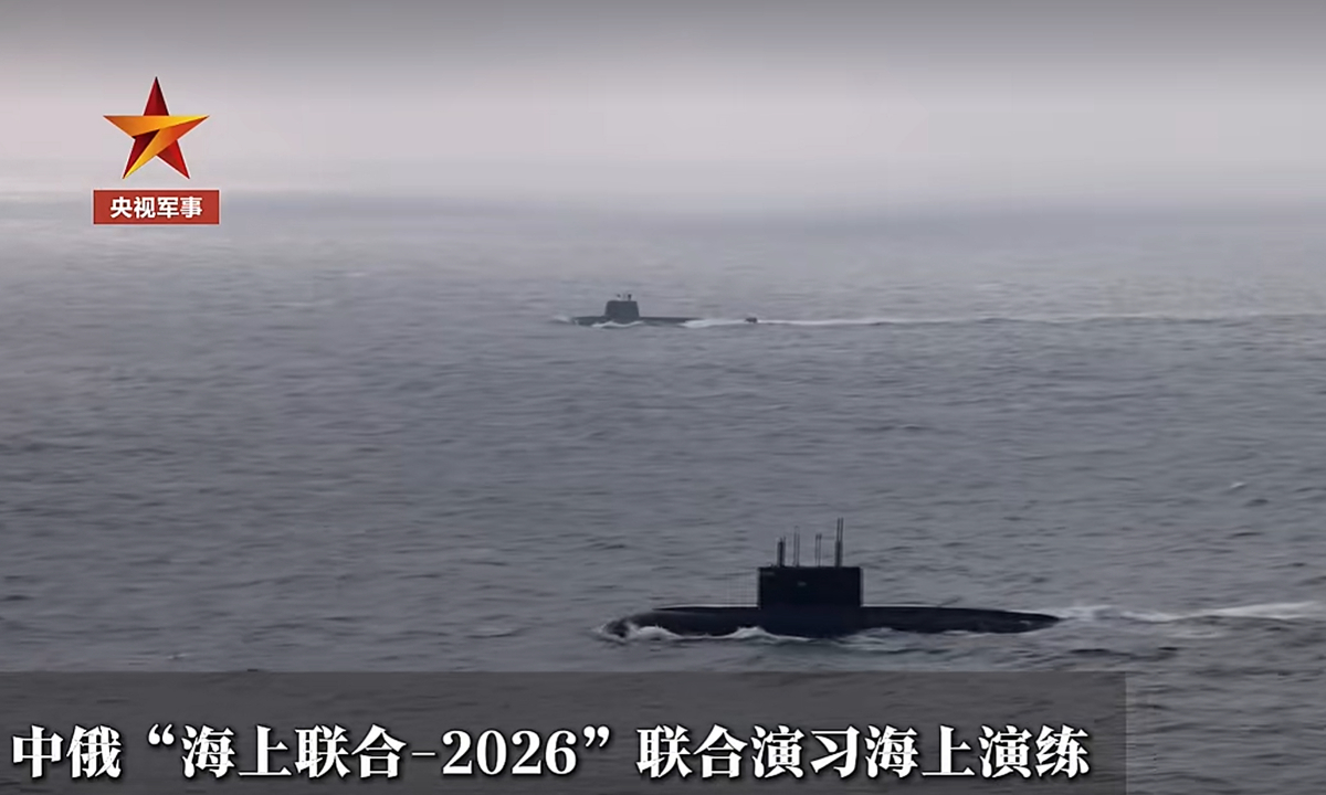Chinese and Russian naval submarines are seen together at sea for the first time. Photo: screenshot from the CCTV Military channel