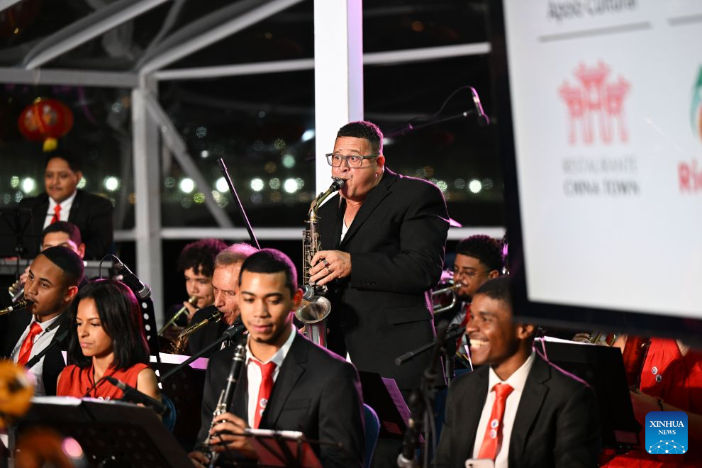 A musician plays the saxophone during a concert marking the 52nd anniversary of China-Brazil diplomatic relations at the Forte de Copacabana in Rio de Janeiro, Brazil, Aug. 16, 2026. The concert was held here on Sunday. (Xinhua/Jin Haoyuan)