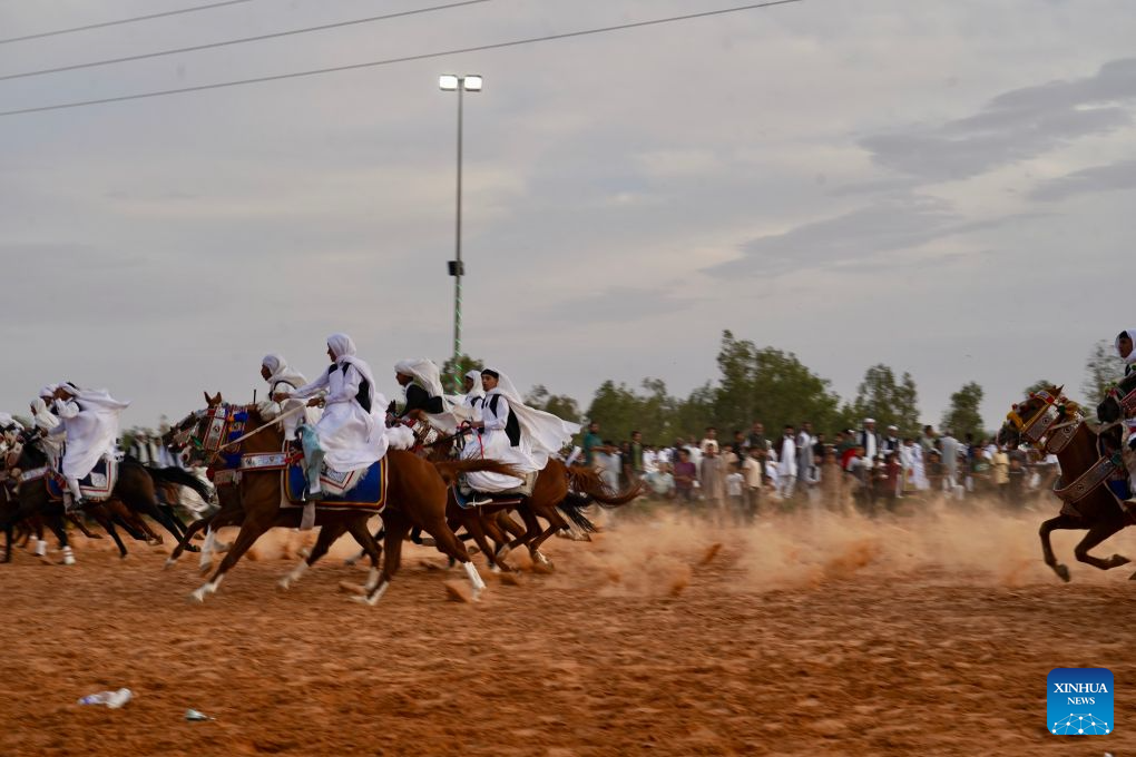 Riders take part in a traditional equestrian festival in Souq al-Khamis Amsihel, Libya, Oct. 7, 2026. (Photo by Hazem Turkia/Xinhua)