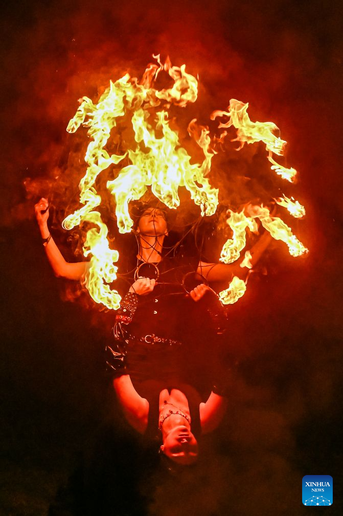 A performer takes part in the Magic Forest charity event for animals held at Paite Loomapark in Ida-Viru County, northeastern Estonia, Aug. 29, 2026. (Photo by Sergei Stepanov/Xinhua)