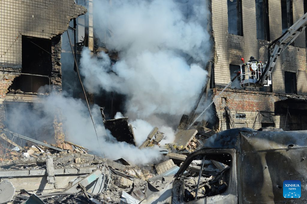 This photo taken on Sept. 8, 2026 shows firefighters working to put out a fire on a building after Russian strikes in Kiev, Ukraine. Seven people were killed as Russia struck Kiev region with drones and missiles overnight. (Photo by Peter Druk/Xinhua)