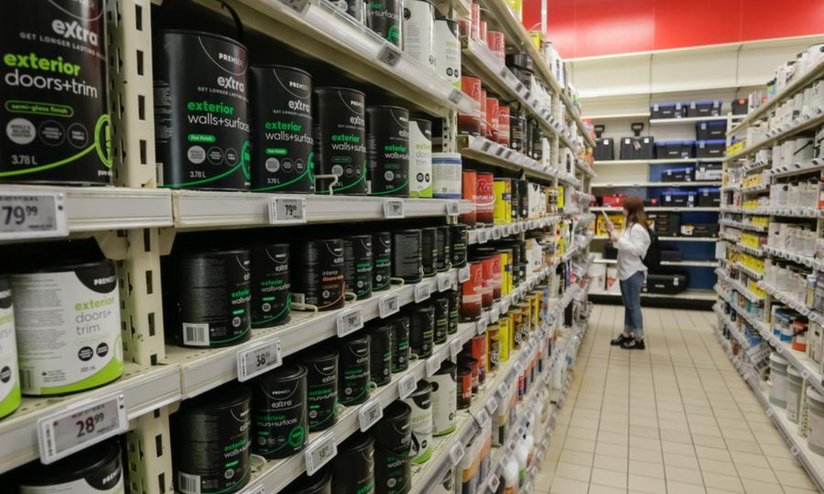 A customer shops for painting supplies at a hardware store in Vancouver, British Columbia, Canada, Aug. 25, 2026. (Photo by Liang Sen/Xinhua)