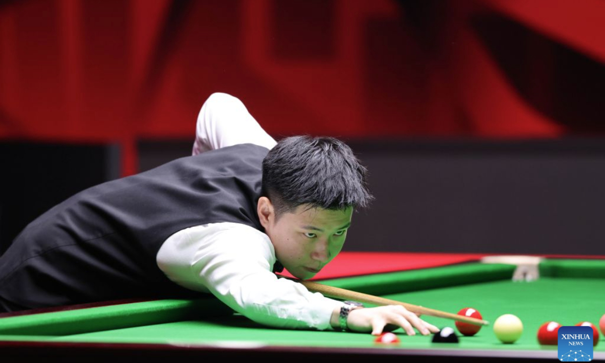 Zhao Xintong competes during the round 2 match between Scott Donaldson of Scotland and Zhao Xintong of China at World Snooker Tour Shenzhen Open 2026 in Shenzhen, south China's Guangdong Province, Sept. 28, 2026. (Xinhua/Liang Xu)
