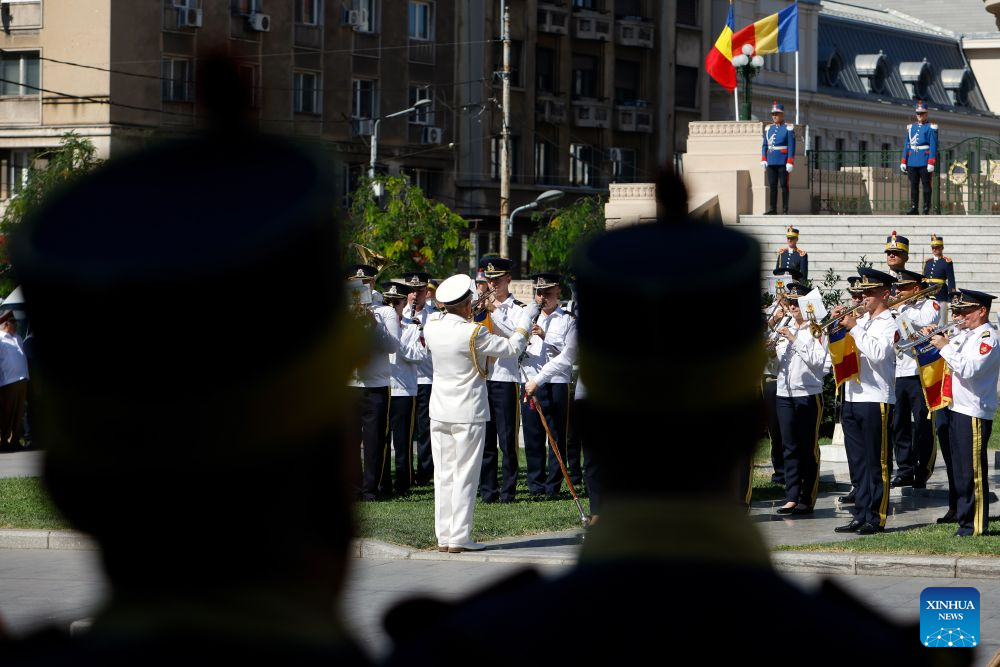 A military band performs during ceremonies marking the National Anthem Day in Bucharest, Romania, July 29, 2026. (Photo by Cristian Cristel/Xinhua)