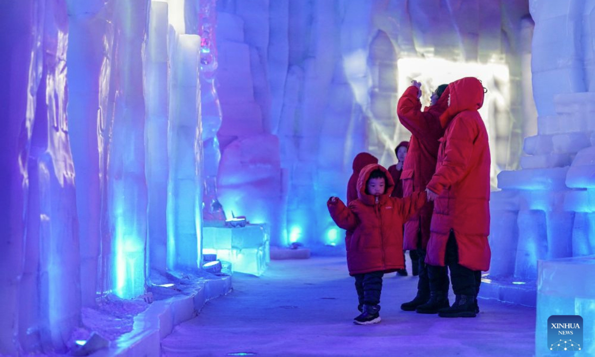 Tourists visit an ice-and-snow pavilion at Harbin Ice-Snow World park in Harbin, northeast China's Heilongjiang Province, on July 21, 2026. (Xinhua/Na Yuqi)