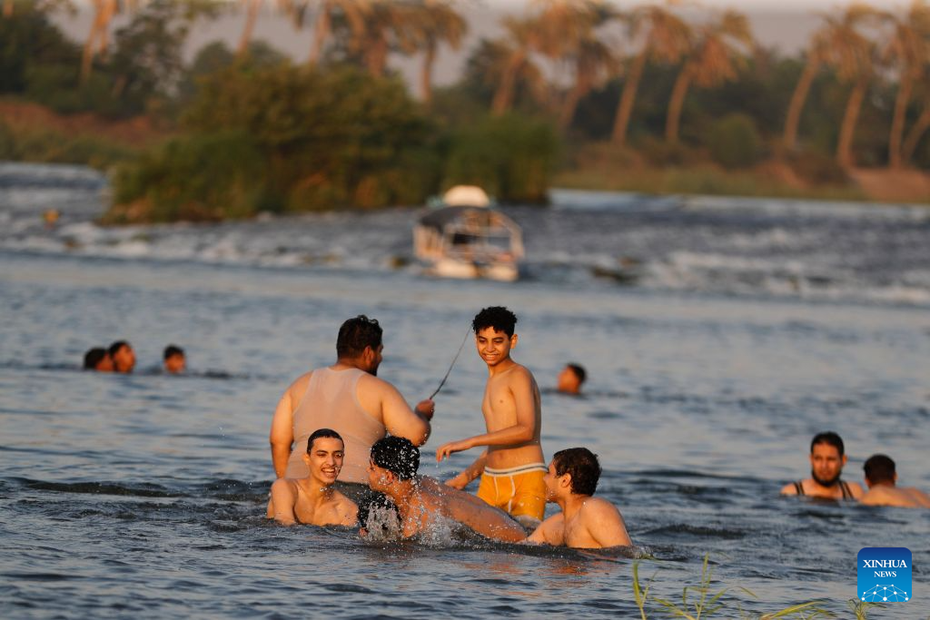 People cool themselves in the Nile River during a heatwave in Cairo, Egypt, Aug. 3, 2026. (Xinhua/Ahmed Gomaa)