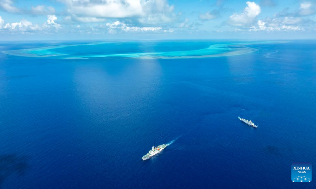 An aerial drone photo taken on July 8, 2026 shows the China Coast Guard vessels Hailing (L) and Daji patrolling in the territorial waters of China's Huangyan Dao in the South China Sea. Huangyan Dao, located in China's Zhongsha Qundao, features a unique coral reef ecosystem and special geological structures. It is home to numerous rare and endangered species, making it an area of high biodiversity and species rarity.
Huangyan Dao is China's inherent territory. In September 2025, China formally approved to establish the Huangyan Dao National Nature Reserve.
The China Coast Guard has carried out regular patrols and law enforcement to safeguard China's territorial sovereignty, maritime rights and interests, and ecological environment in the waters of the reserve. (Xinhua/Wang Peng)