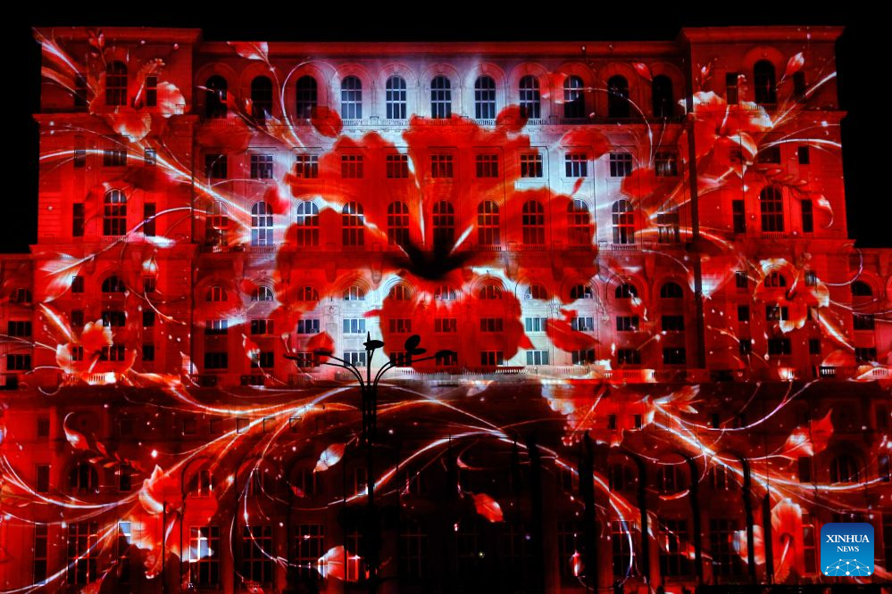 A 3D projection is seen during the iMapp Bucharest 2026, on the facade of the Parliament Palace, in Bucharest, Romania, Sept. 19, 2026. (Photo by Cristian Cristel/Xinhua)