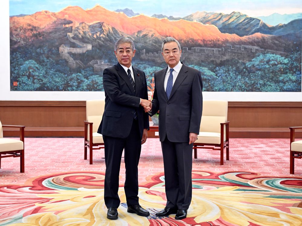 Wang Yi, a member of the Political Bureau of the Communist Party of China (CPC) Central Committee and director of the Office of the Foreign Affairs Commission of the CPC Central Committee, meets with Takeshi Iwaya, president of the Japanese Association for the Promotion of International Trade (JAPIT), in Beijing, capital of China, Sept. 28, 2026. (Xinhua/Yin Bogu)