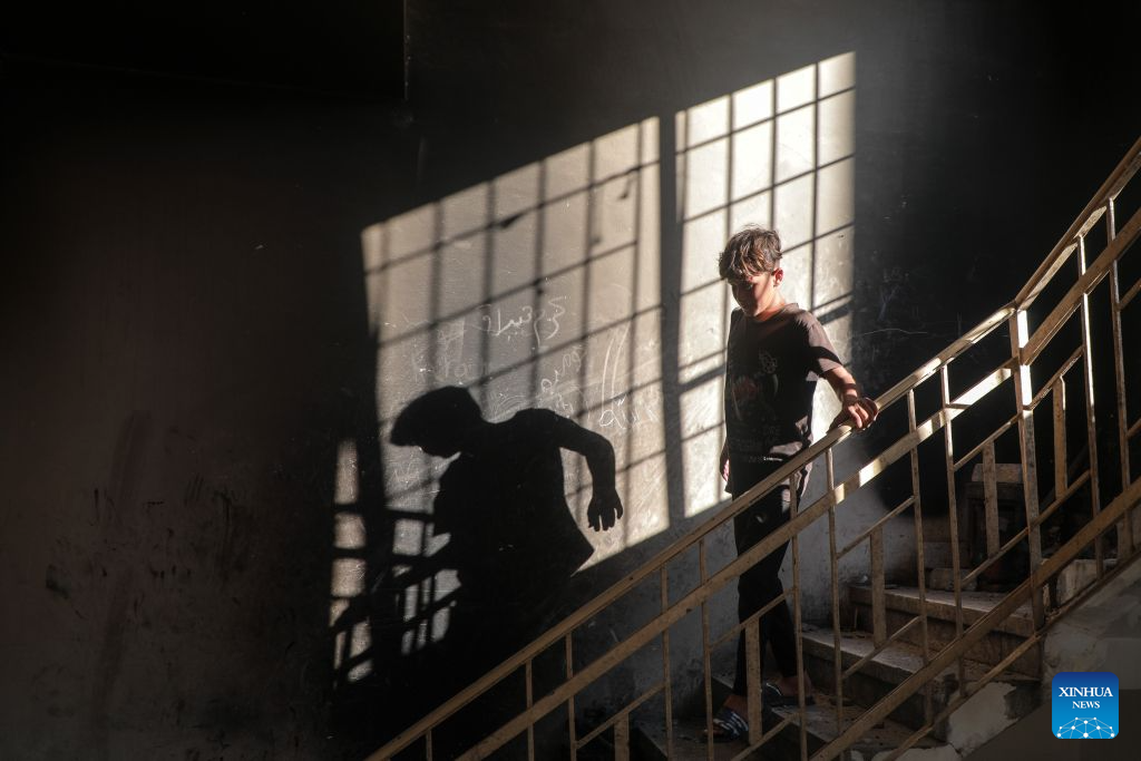 A Palestinian checks a destroyed residential apartment following an Israeli airstrike in Gaza City, Sept. 8, 2026. (Photo by Rizek Abdeljawad/Xinhua)