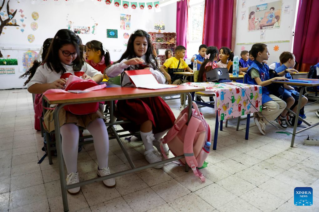 Students prepare for class at a school in Algiers, Algeria, on Sept. 21, 2026. Nearly 12 million students in primary and middle schools across Algeria returned to school on Monday. (Photo by Billel Bensalem/Xinhua)