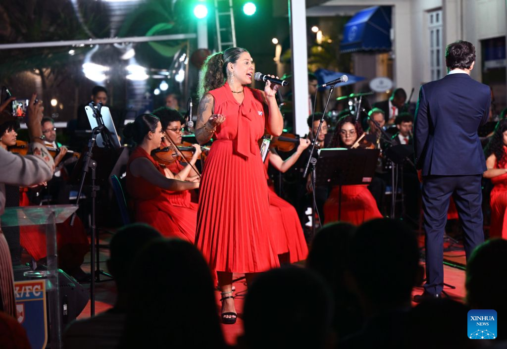 A Brazilian singer sings a Chinese song during a concert marking the 52nd anniversary of China-Brazil diplomatic relations at the Forte de Copacabana in Rio de Janeiro, Brazil, Aug. 16, 2026. The concert was held here on Sunday. (Xinhua/Jin Haoyuan)