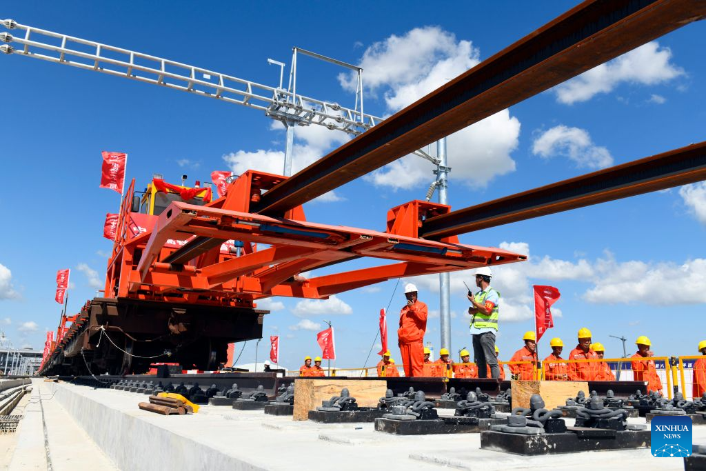 Staff members from China Railway 21st Bureau Group Corporation Limited carry out a continuous welded rail installation task for the Tianjin-Weifang High-Speed Railway at the Dongying South Railway Station in Dongying City, east China's Shandong Province, Sept. 1, 2026. The construction of the Tianjin-Weifang High-Speed Railway entered the track-laying phase on Tuesday, with continuous welded rail installation tasks starting respectively from Dongying South Railway Station and Binzhou Railway Station on the day.

Connecting Binhai Station in north China's Tianjin Municipality and Weifang North Station in east China's Shandong Province with a total length of approximately 349 kilometers and a designed speed of 350 kilometers per hour, the Tianjin-Weifang High-Speed Railway belongs to a greater high-speed rail artery network consisting eight vertical lines and eight horizontal lines in the country. (Xinhua/Guo Xulei)