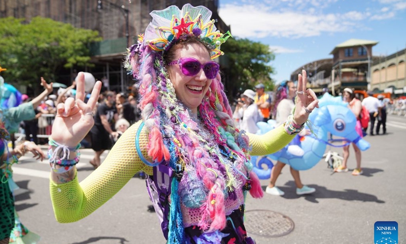 People participate in the 2026 Mermaid Parade on the Coney Island in New York, the United States, June 20, 2026. (Xinhua/Zhang Fengguo)
