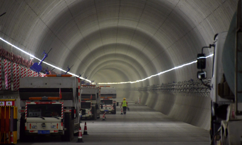 Material transport vehicles park at the construction site of the Jintang undersea tunnel of the Ningbo-Zhoushan high-speed railway in Ningbo, East China's Zhejiang Province. It is the world's longest undersea high-speed rail tunnel. File photo: VCG