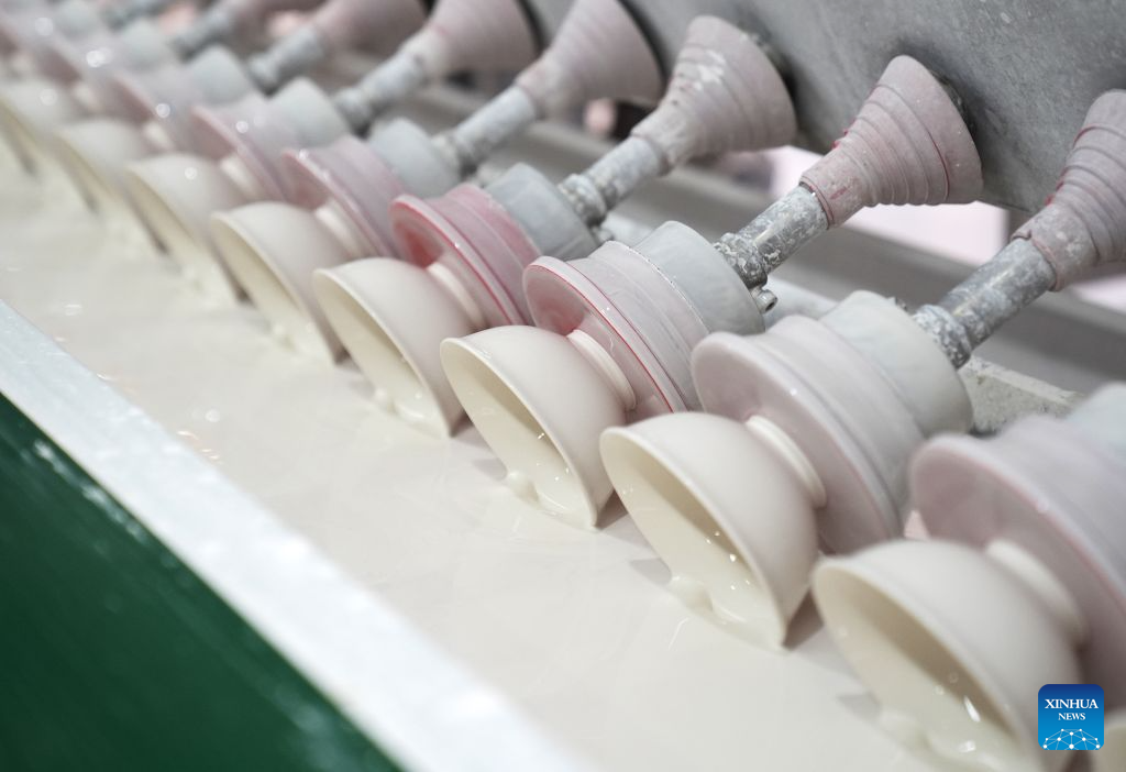 This photo taken on Sept. 10, 2026 shows an automated glazing line at an intelligent workshop in Jingdezhen, east China's Jiangxi Province. Jingdezhen, known worldwide as China's