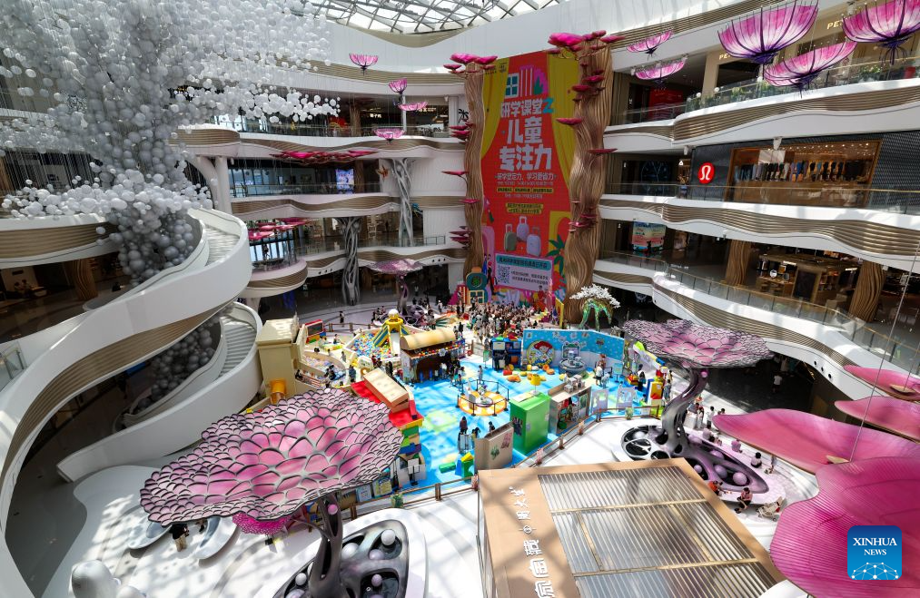 This photo taken on July 18, 2026 shows an interior view of Haikou International Duty Free Shopping Complex in Haikou, south China's Hainan Province. Hainan is stepping up with efforts to build a world-class destination for international tourism and consumption as a key component of the Hainan Free Trade Port, and to probe for a new path towards high-quality development in its tourism-led consumer economy with distinctive local characteristics.
Hainan is projected to annually receive 154 million counts of domestic and international visits by 2030, along with tourism-related revenue of 363 billion yuan (about 53.83 billion U.S. dollars). (Xinhua/Yang Guanyu)