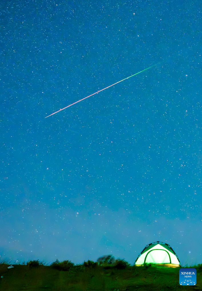 This photo taken on Aug. 12, 2026 shows Perseid meteor shower over Tongjiang City, northeast China's Heilongjiang Province. Perseid meteor shower, which peaks on August 12 and 13 this year, is an annual meteor shower that occurs from mid-July to late August. (Photo by Li Wenbin/Xinhua)