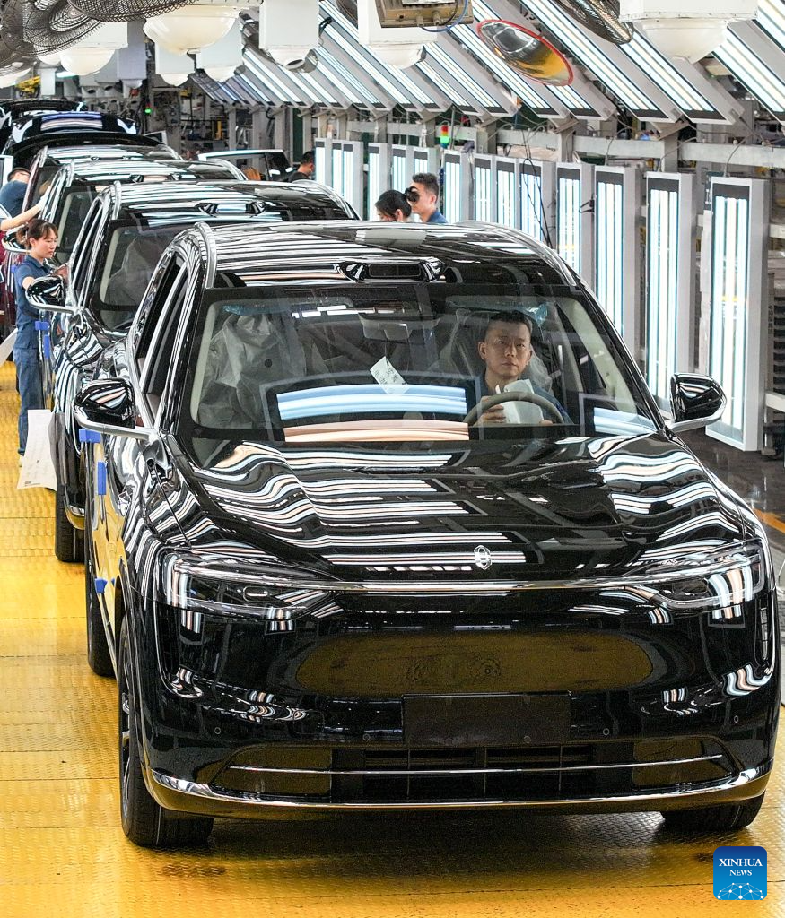 This photo taken on July 16, 2026 shows new energy vehicles at a super factory of carmaker Seres in southwest China's Chongqing Municipality. (Xinhua/Wang Quanchao)