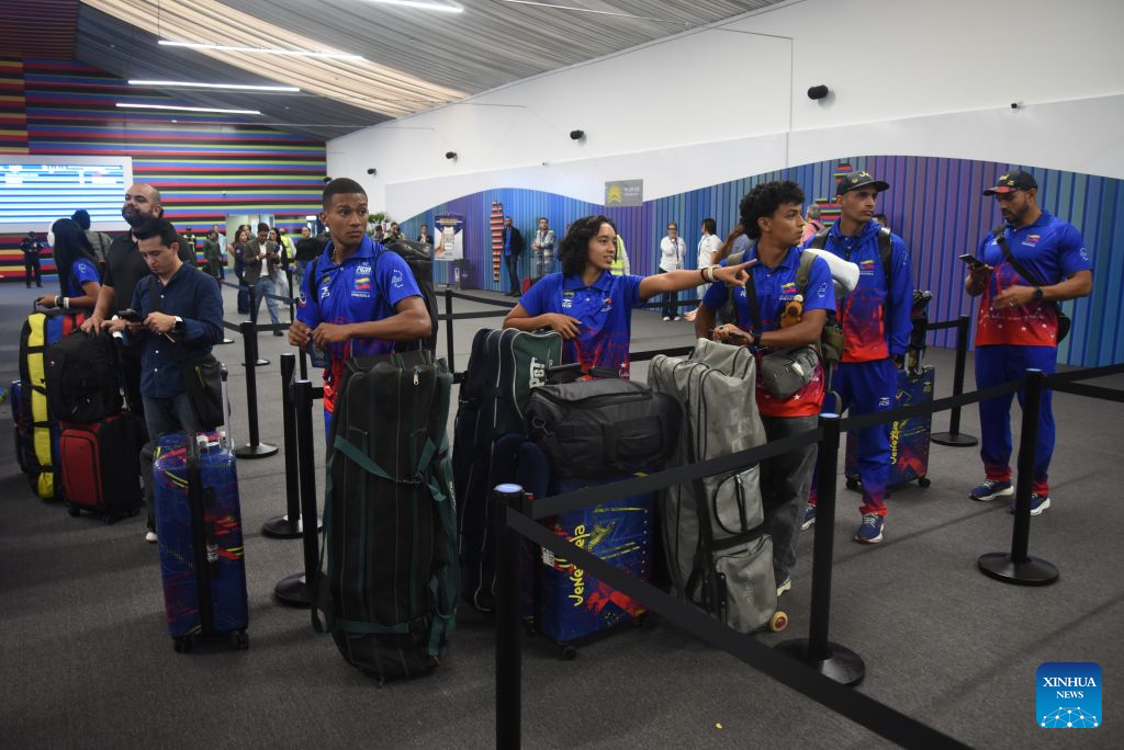 Passengers line up for check-in procedures in a temporary terminal at Maiquetia International Airport in Maiquetia, La Guaira state, Venezuela, on Sept. 1, 2026. Maiquetia International Airport, Venezuela's main airport serving Caracas, formally resumed commercial operations Tuesday at temporary terminals built after its original infrastructure was damaged by the June 24 earthquakes. (Photo by Marcos Salgado/Xinhua)