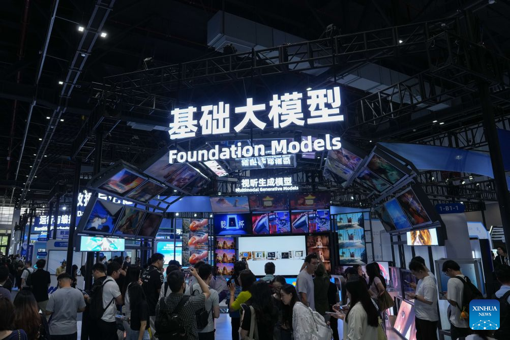 People visit the Foundation Models exhibition area during the 2026 Apsara Conference in Hangzhou, east China's Zhejiang Province, Sept. 22, 2026. The 2026 Apsara Conference opened here on Tuesday, and will last for three days. The conference has three main forums and more than 120 sub-forums. (Xinhua/Huang Zongzhi)