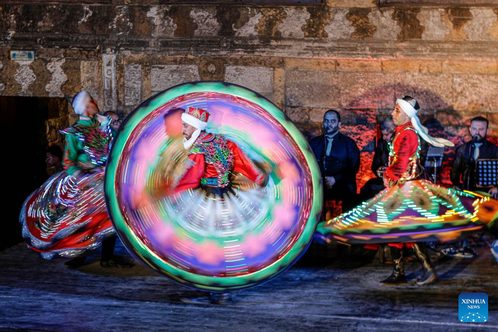 Dancers perform Tanoura, a traditional Egyptian folk dance, during the second edition of Heritage Revival Week in Cairo, Egypt, Aug. 25, 2026. (Xinhua/Ahmed Gomaa)