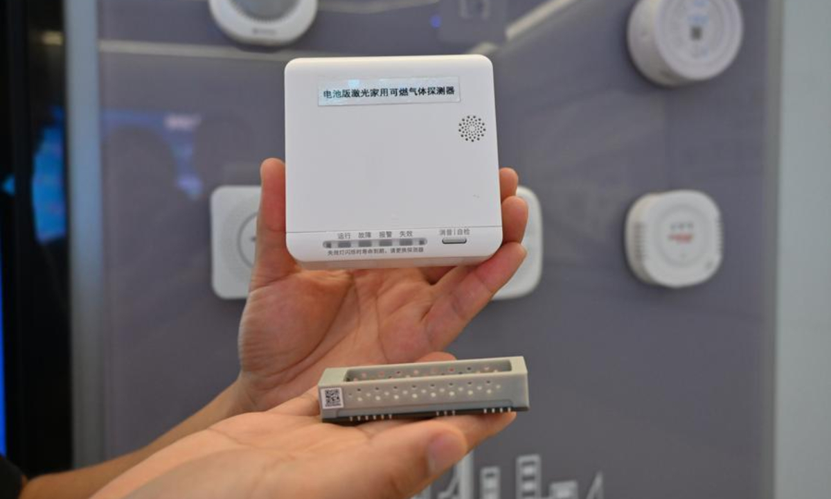 A battery-powered laser detector for combustible gas and a low-power laser sensor for methane, both for household use, are pictured at Hefei Tsingsensor Technology Co., Ltd. in Hefei, east China's Anhui Province, Aug. 5, 2026. (Photo by Lin Qiujin/Xinhua)