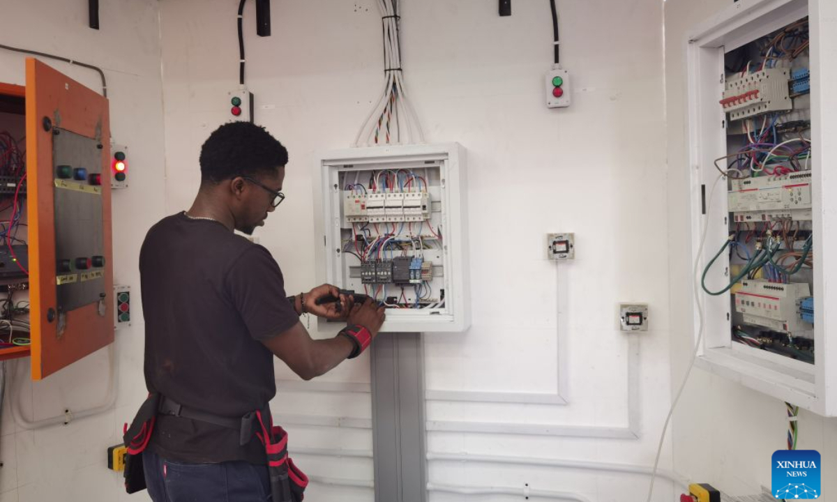 This photo taken with a mobile phone on Sept. 1, 2026 shows Abel Ashimbanga working during a training session at the training center of state-owned power utility NamPower in Windhoek, Namibia. (Photo by Ndalimpinga Iita/Xinhua)