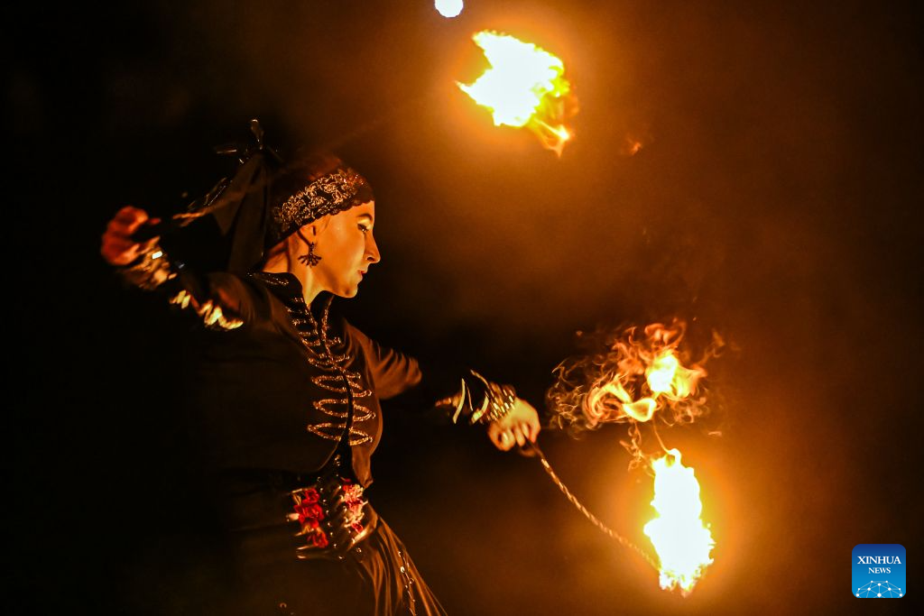A performer takes part in the Magic Forest charity event for animals held at Paite Loomapark in Ida-Viru County, northeastern Estonia, Aug. 29, 2026. (Photo by Sergei Stepanov/Xinhua)