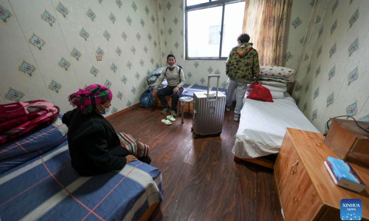 A family evacuated from Labi Village is resettled at a hostel in Jifu Village of Gyirong County in Xigaze, southwest China's Xizang Autonomous Region, Aug. 27, 2026. Residents affected by a mudslide in Gyirong County, southwest China's Xizang Autonomous Region, have been resettled, and all stranded tourists have been transferred, local authorities said Thursday. (Xinhua/Jigme Dorje)