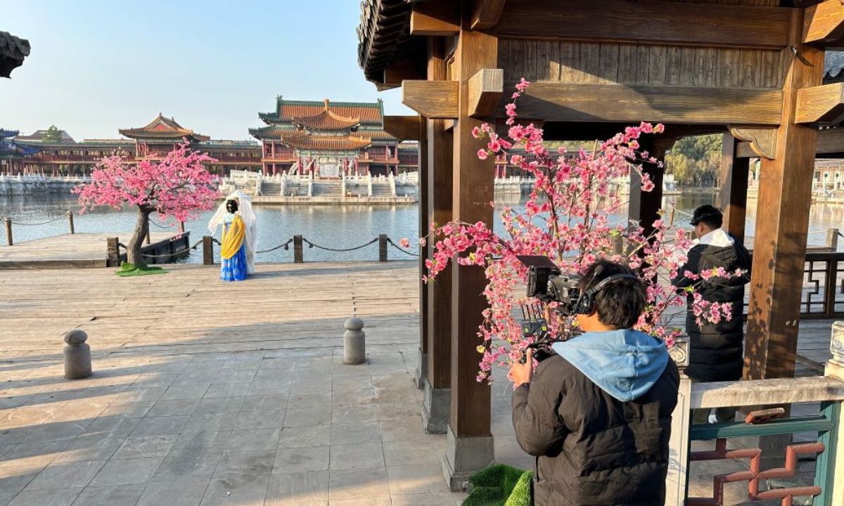 Crew of a micro-short drama shoot at Hengdian World Studio in Dongyang, east China's Zhejiang Province, Dec. 25, 2025.  (Xinhua/Liu Ziyi)