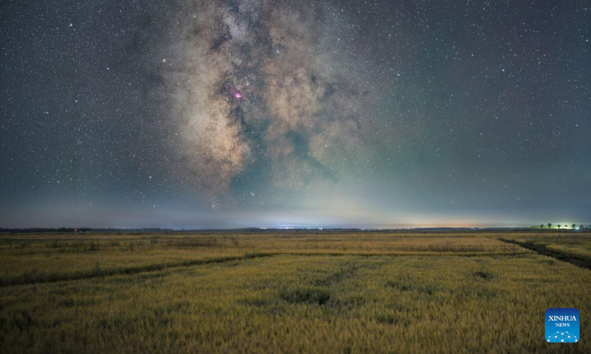This stack composite photo taken on Sept. 15, 2026 shows rice paddies under starry sky in Daqing City, northeast China's Heilongjiang Province. (Photo by Chi Shiyong/Xinhua)