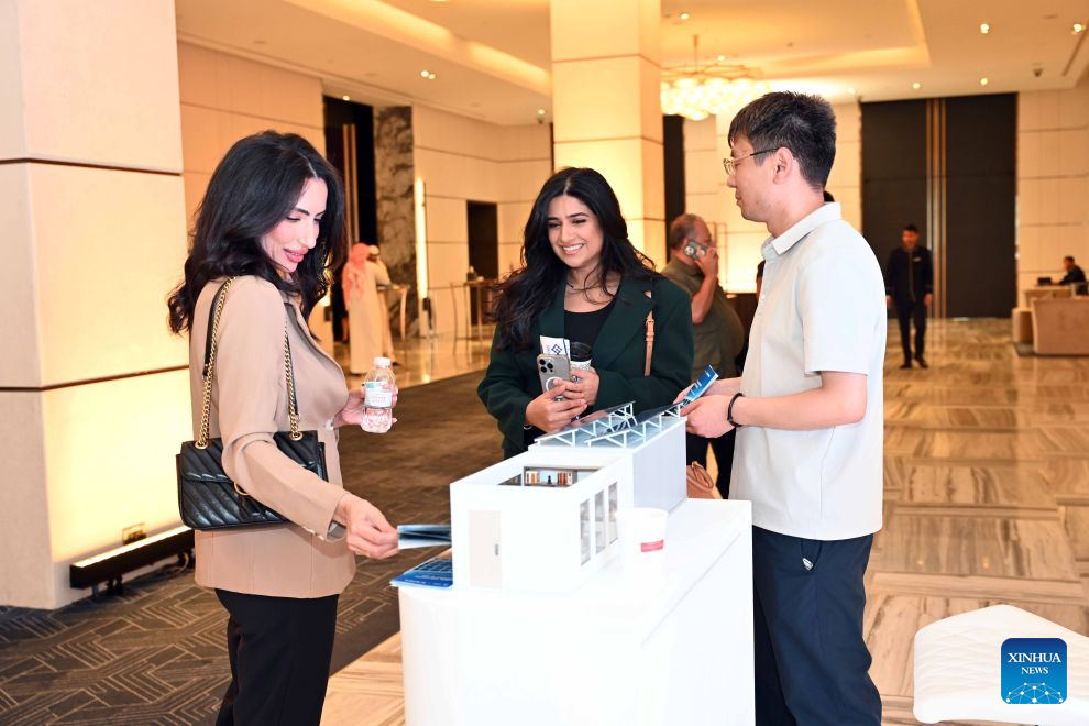People visit the booth of China State Construction Engineering Corporation Ltd. (CSCEC) Kuwait during the Housing and Urban Development Forum 2026 in Hawalli Governorate, Kuwait, Sept. 8, 2026. The Housing and Urban Development Forum 2026 opened here on Tuesday alongside the sixth edition of the Baiti Building Exhibition, bringing together government officials, investors, developers and companies from Kuwait's housing, real estate and construction sectors. (Photo by Asad/Xinhua)