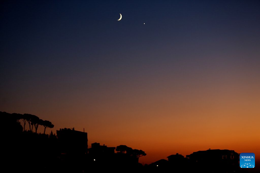 This photo taken on Sept. 14, 2026 shows the planet of Venus next to the moon in the sky over Jouret al-Ballout village, Lebanon. (Xinhua/Bilal Jawich)