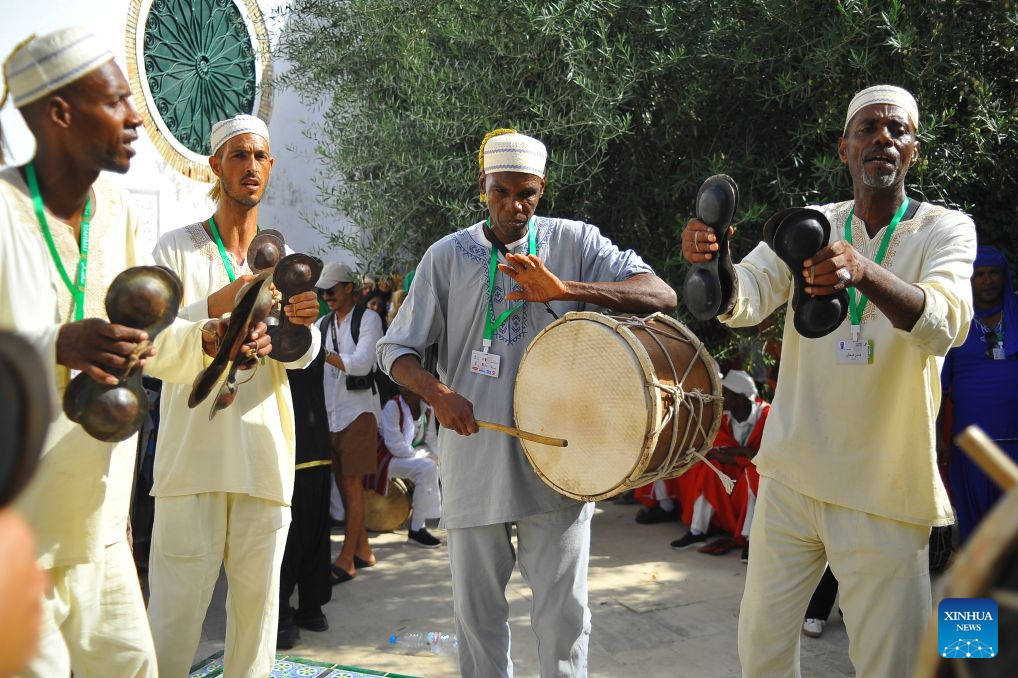 Artists perform during a celebration for Mawlid al-Nabi, which commemorates birth of the Islamic founder Prophet Muhammad, in Tunis, Tunisia, Aug. 25, 2026. (Photo by Adel Ezzine/Xinhua)