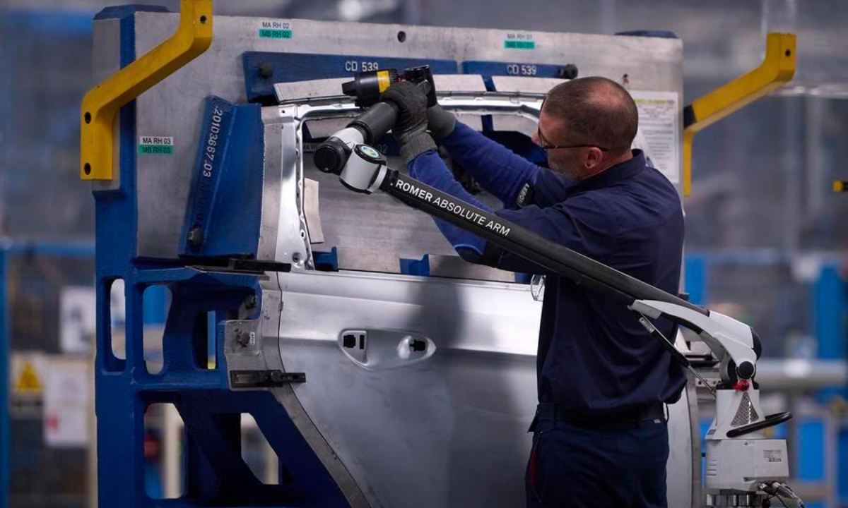 An employee work in a Ford factory in Valencia, Spain, July 23, 2026. Geely Automobile Holdings and Ford Motor Company on Thursday announced a deal to produce new energy vehicles for the European market at Ford's manufacturing plant in Valencia, Spain. (Photo by Pablo Morano/Xinhua)