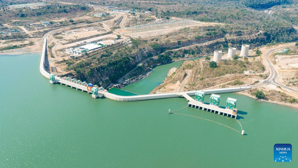 An aerial drone photo taken on Aug. 21, 2026 shows a view of the Julius Nyerere Hydropower Plant in Coast Region, Tanzania. Tanzanian President Samia Suluhu Hassan on Saturday inaugurated the 2,115-megawatt Julius Nyerere Hydropower Plant, a landmark project expected to strengthen electricity supply and accelerate industrial and economic development. (Xinhua/Emmanuel Herman)