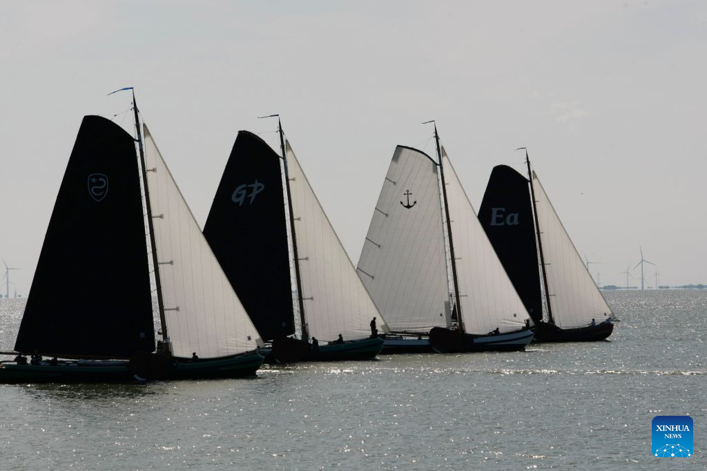 Boats compete during the 2026 Open Frisian Championships (IFKS) in Stavoren, the Netherlands, on Aug. 2, 2026. (Xinhua/Shao Haijun)