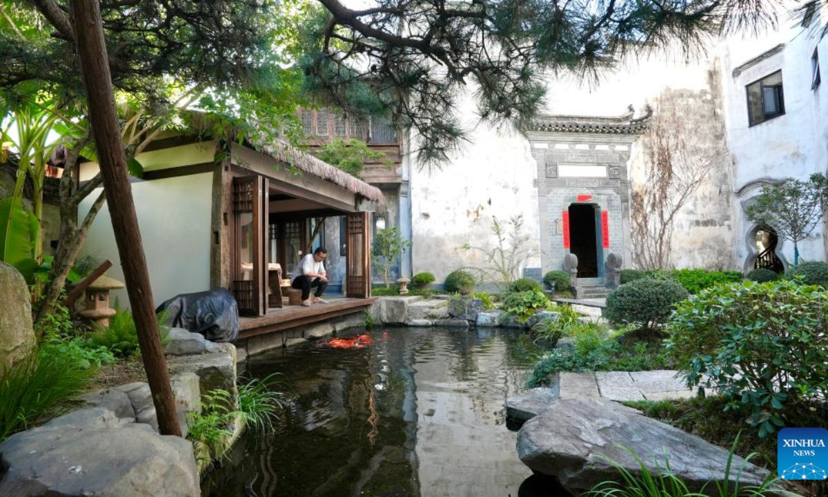 A tourist enjoys his leisure time at a homestay in Wuyuan County, east China's Jiangxi Province, on Aug. 26, 2026.
Wuyuan County is known for its picturesque countryside and well-preserved traditional villages.
With two national 5A-rated tourist attractions and 12 national 4A-rated attractions, the county has been promoting rural tourism and creating more employment opportunities for local residents through tourism-related employment and entrepreneurship.
Today, Wuyuan is home to more than 1,300 rural homestays, while the tourism industry directly supports more than 80,000 jobs. (Xinhua/Hu Chenhuan)