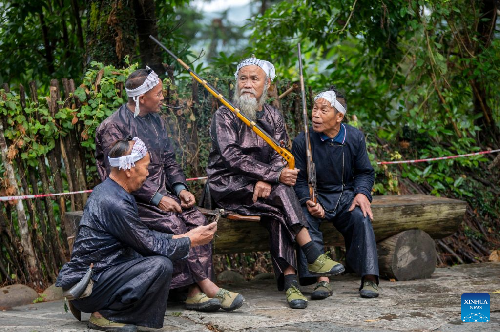 Villagers wait to welcome visitors at Basha Village in Congjiang County of Qiandongnan Miao and Dong Autonomous Prefecture, southwest China's Guizhou Province, Oct. 2, 2026. Located seven kilometers away from the county seat of Congjiang, Basha Village has attracted an increasing number of overseas tourists with its charming scenery and simple folk customs recently.
Consisting of five hamlets and inhabited by the Miao people, the village was included in the first batch of China's traditional villages in 2012. Riding the viral Chinamaxxing wave on social media, foreign tourists have come here to experience ancient ways of life and profound cultural heritage.
Data from the National Immigration Administration shows that China recorded 22.91 million inbound foreign visits in the first half of this year, up 20.4 percent year on year. (Photo by Wu Dejun/Xinhua)