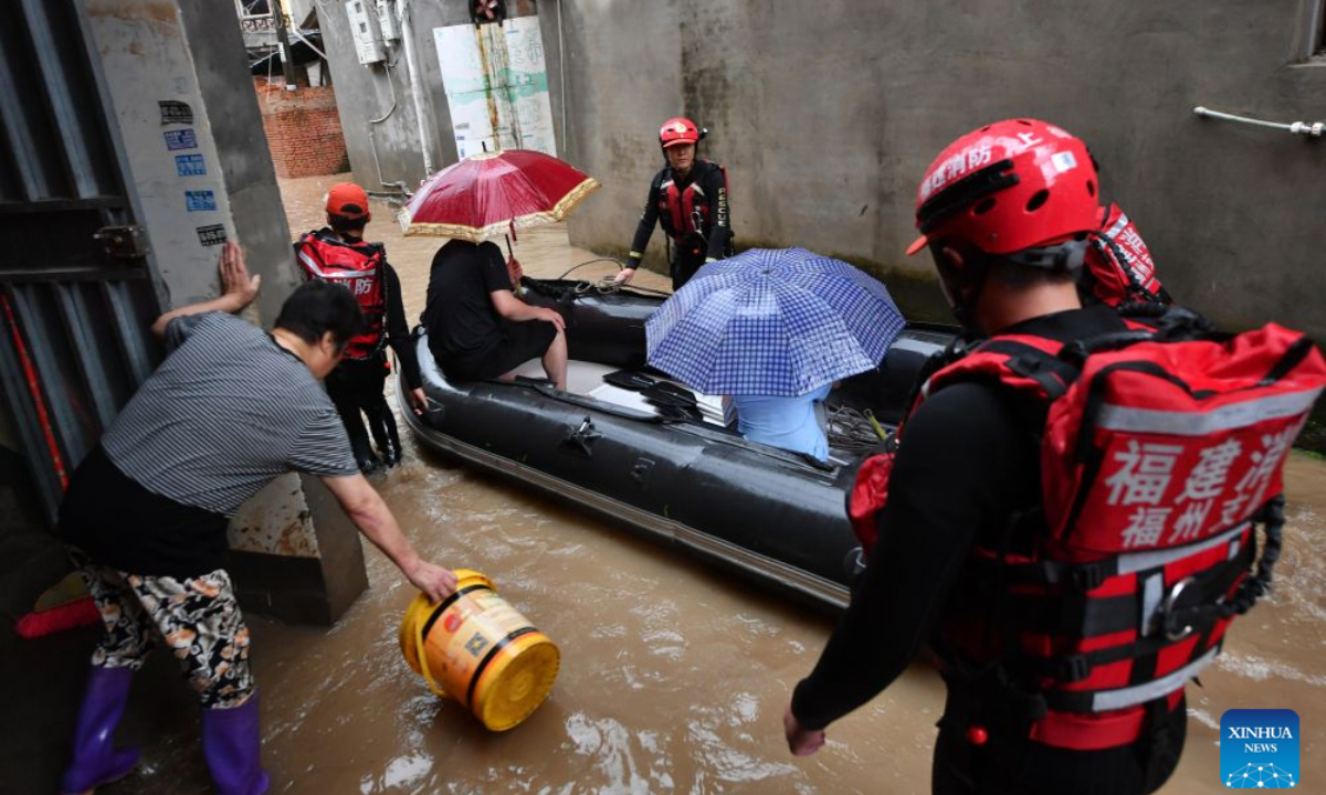Rescuers evacuate residents in Nanqian Village of Minhou County, southeast China's Fujian Province, Sept. 3, 2026. Typhoon Saudel brought torrential rains to Minhou County of Fujian Province, resulting in waterlogging in some areas. Emergency flood-control, drainage and resident-evacuation operations were conducted to safeguard public safety. (Xinhua/Jiang Kehong)
