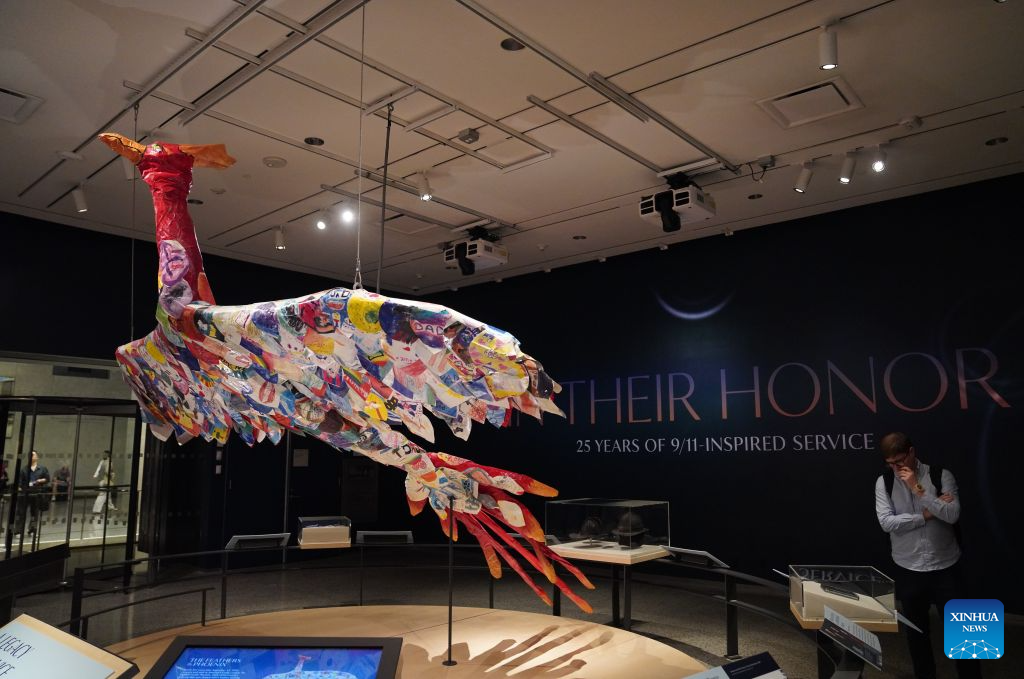 A person views an exhibit at the National September 11 Memorial & Museum in New York, the United States, on Aug. 31, 2026. A preview of an exhibition marking the 25th anniversary of the 9/11 attacks was held here on Monday. (Xinhua/Zhang Fengguo)