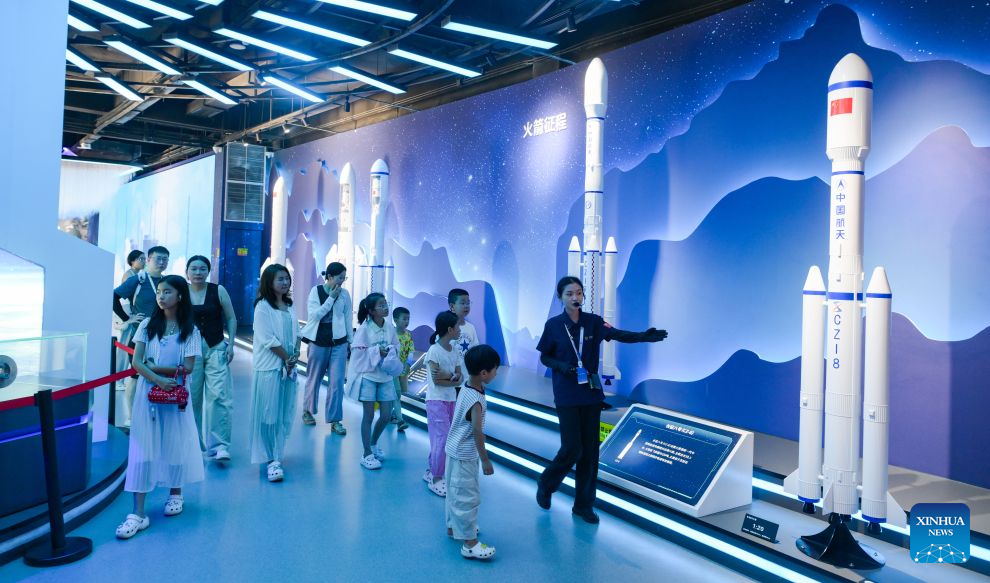 Tourists visit Wenchang Spaceflight Science Center in Wenchang, south China's Hainan Province, July 24, 2026. Hainan is stepping up with efforts to build a world-class destination for international tourism and consumption as a key component of the Hainan Free Trade Port, and to probe for a new path towards high-quality development in its tourism-led consumer economy with distinctive local characteristics.
Hainan is projected to annually receive 154 million counts of domestic and international visits by 2030, along with tourism-related revenue of 363 billion yuan (about 53.83 billion U.S. dollars). (Xinhua/Yang Guanyu)