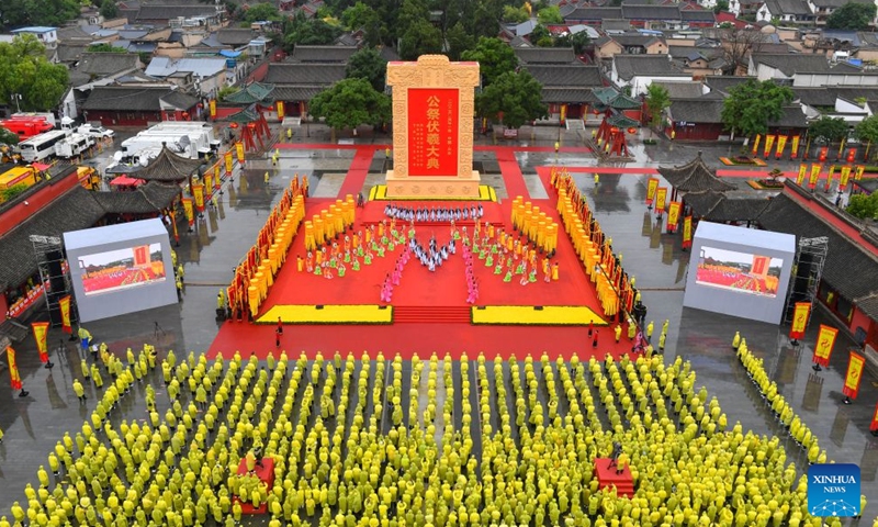 A drone photo taken on June 21, 2026 shows a ceremony worshiping Fuxi, a mythical ancestor of the Chinese nation, in Tianshui, northwest China's Gansu Province. Tianshui is known as the birthplace of the mythical figure, who is worshiped for his contribution to teaching people about fishing, hunting and animal husbandry. According to historical records, the annual commemoration of Fuxi has a history of more than 2,000 years. It was listed as a form of national intangible cultural heritage in 2006. (Photo by Zhou Wentao/Xinhua)