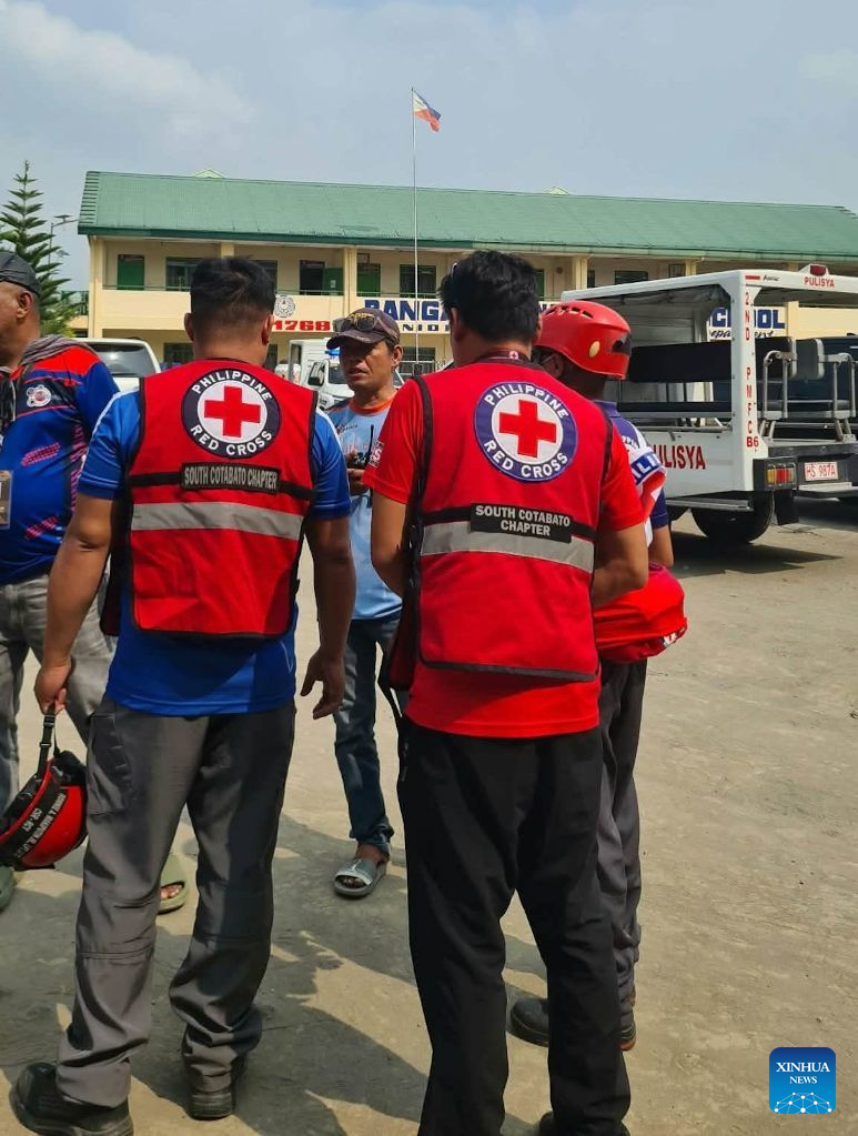 Volunteers from the Philippine Red Cross are pictured at the site of a school shooting at a high school in the municipality of Banga, South Cotabato Province, the Philippines, Sept. 18, 2026. At least six people were killed and 17 others injured in a school shooting in southern Philippines on Friday, according to the Department of Social Welfare and Development (DSWD). (Philippine Red Cross/Handout via Xinhua)