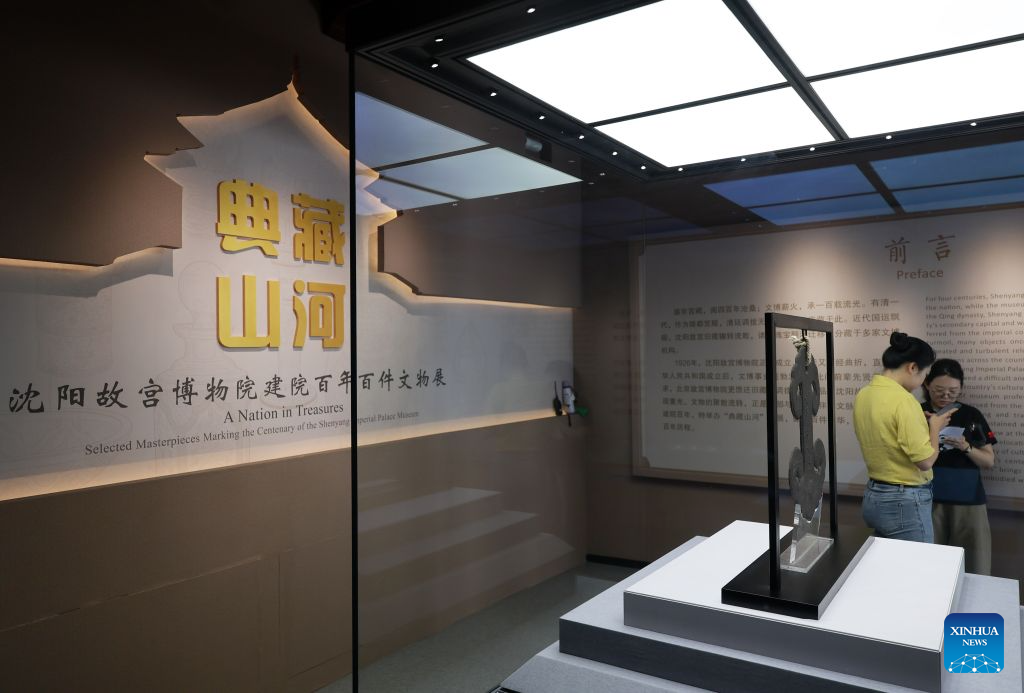 Journalists visit the exhibition titled A Nation in Treasures: Selected Masterpieces Marking the Centenary of the Shenyang Imperial Palace Museum at Shenyang Palace Museum in Shenyang, northeast China's Liaoning Province, Aug. 11, 2026. The exhibition revisits the museum's 100-year history through 100 exhibits in multiple categories, and is expected to run until the end of the year. (Xinhua/Li Gang)